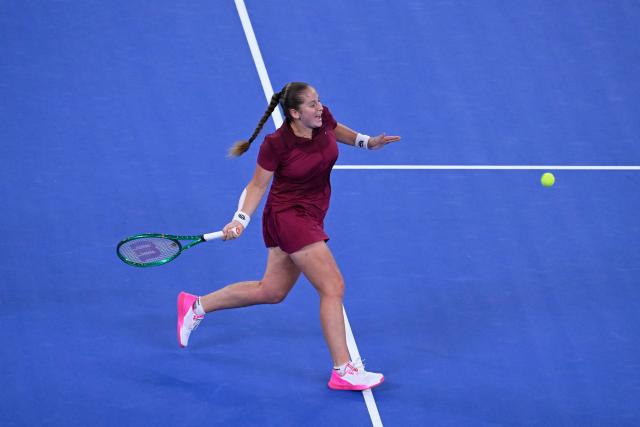 Latvia's Jelena Ostapenko hits a return to Sonay Kartal during their women's singles semi-final match at the Wuhan Open tennis tournament in Wuhan, China's Hubei province on October 17, 2026. (Photo by WANG Zhao / AFP)