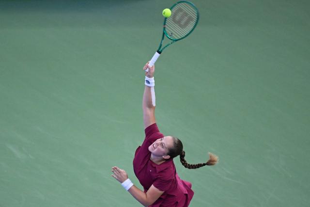 Britain's Sonay Kartal serves to Latvia's Jelena Ostapenko during their women's singles semi-final match at the Wuhan Open tennis tournament in Wuhan, China's Hubei province on October 17, 2026. (Photo by WANG Zhao / AFP)