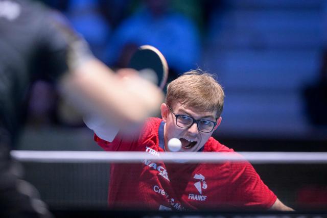France’s Alexis Lebrun plays a shot as he competes against Germany’s Dang Qiu during the men’s singles quarter-final match of the 2026 ETTU European Individual Table Tennis Championships at The Arena Stozice in Ljubljana on October 17, 2026. (Photo by Jure Makovec / AFP)