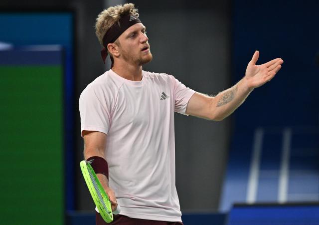 Spain's Alejandro Davidovich Fokina reacts between point against Germany's Alexander Zverev during their men's singles semi-final match at the Shanghai Masters tennis tournament in Shanghai on October 17, 2026. (Photo by Hector RETAMAL / AFP)