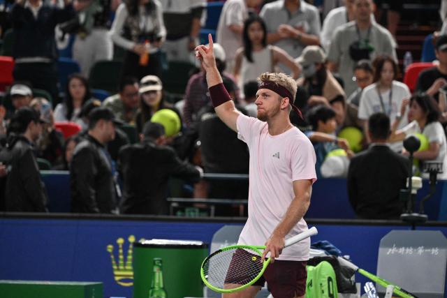 Spain's Alejandro Davidovich Fokina celebrates his victory against Germany's Alexander Zverev during their men's singles semi-final match at the Shanghai Masters tennis tournament in Shanghai on October 17, 2026. (Photo by Hector RETAMAL / AFP)