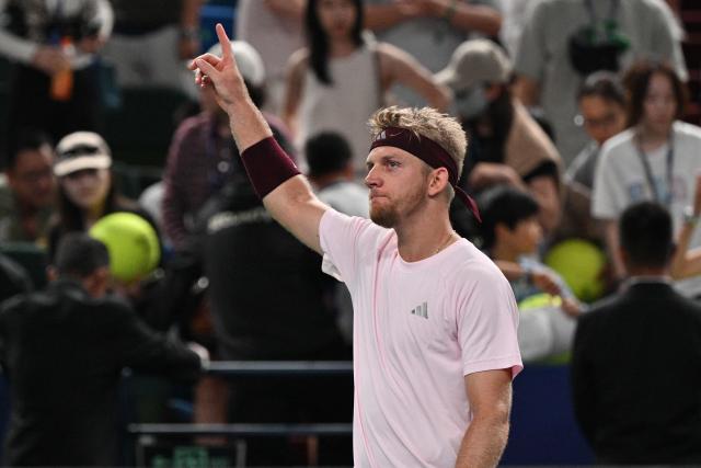 Spain's Alejandro Davidovich Fokina celebrates his victory against Germany's Alexander Zverev during their men's singles semi-final match at the Shanghai Masters tennis tournament in Shanghai on October 17, 2026. (Photo by Hector RETAMAL / AFP)