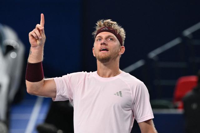 Spain's Alejandro Davidovich Fokina celebrates his victory against Germany's Alexander Zverev during their men's singles semi-final match at the Shanghai Masters tennis tournament in Shanghai on October 17, 2026. (Photo by Hector RETAMAL / AFP)