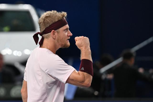Spain's Alejandro Davidovich Fokina celebrates his victory against Germany's Alexander Zverev during their men's singles semi-final match at the Shanghai Masters tennis tournament in Shanghai on October 17, 2026. (Photo by Hector RETAMAL / AFP)