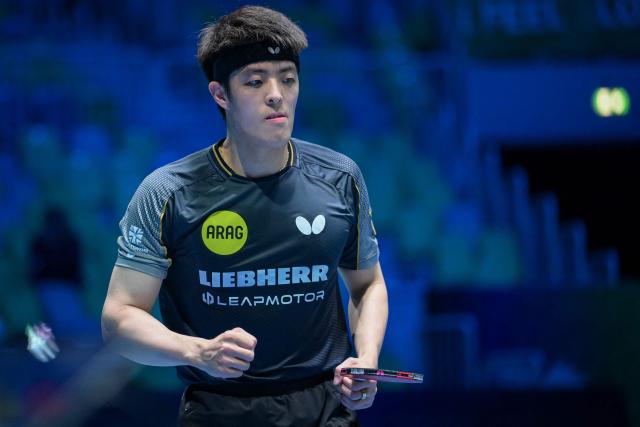 Germany’s Dang Qiu reacts after winning the men’s singles quarter-final match of the 2026 ETTU European Individual Table Tennis Championships against France’s Alexis Lebrun at The Arena Stozice in Ljubljana on October 17, 2026. (Photo by Jure Makovec / AFP)