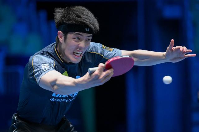 Germany’s Dang Qiu competes against France’s Alexis Lebrun during the men’s singles quarter-final match of the 2026 ETTU European Individual Table Tennis Championships at The Arena Stozice in Ljubljana on October 17, 2026. (Photo by Jure Makovec / AFP)