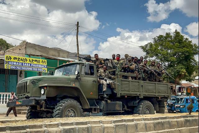 TOPSHOT - Members of the Ethiopian National Defense Force (ENDF) travel on a truck following clashes between Ethiopian federal forces and armed groups opposed to the government in Adigrat on October 17, 2026. Ethiopian Prime Minister Abiy Ahmed announced the establishment of an interim administration in the northern Tigray region, which has been controlled by rebels who have clashed with federal forces in recent weeks.
The Tigray People's Liberation Front (TPLF) launched a major offensive against government forces on September 23, before being pushed back and losing control of its strongholds, including the regional capital Mekelle.
In late September, the TPLF formed an uneasy alliance with several disparate armed groups opposed to the government. The group has also moved closer to neighbouring Eritrea, long at odds with Ethiopia. (Photo by AFP)