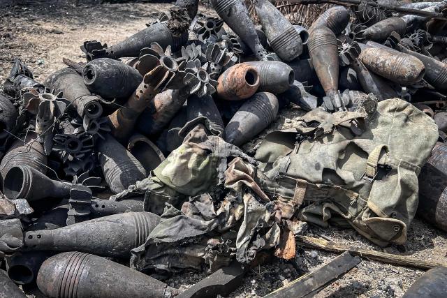 Mortar shells and other ammunition remnants lie scattered along a road following clashes between Ethiopian federal forces and armed groups opposed to the government in Adigrat on October 17, 2026. Ethiopian Prime Minister Abiy Ahmed announced the establishment of an interim administration in the northern Tigray region, which has been controlled by rebels who have clashed with federal forces in recent weeks.
The Tigray People's Liberation Front (TPLF) launched a major offensive against government forces on September 23, before being pushed back and losing control of its strongholds, including the regional capital Mekelle.
In late September, the TPLF formed an uneasy alliance with several disparate armed groups opposed to the government. The group has also moved closer to neighbouring Eritrea, long at odds with Ethiopia. (Photo by AFP)