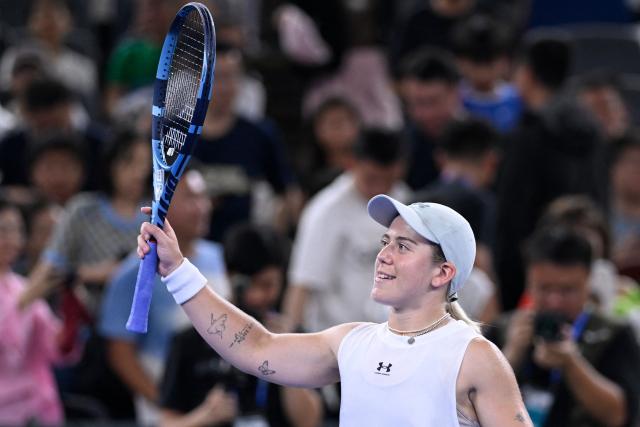 Britain's Sonay Kartal celebrates after winning against Latvia's Jelena Ostapenko during their women's singles semi-final match at the Wuhan Open tennis tournament in Wuhan, China's Hubei province on October 17, 2026. (Photo by WANG Zhao / AFP)