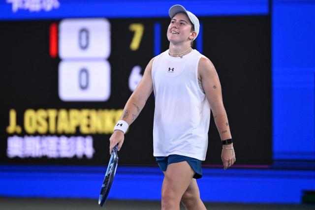 Britain's Sonay Kartal reacts after winning against Latvia's Jelena Ostapenko during their women's singles semi-final match at the Wuhan Open tennis tournament in Wuhan, China's Hubei province on October 17, 2026. (Photo by WANG Zhao / AFP)