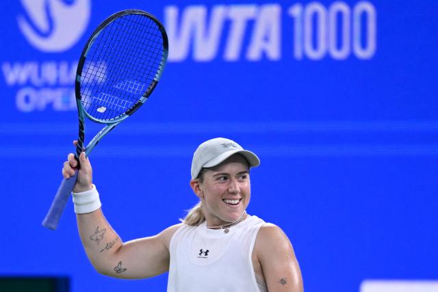 Britain's Sonay Kartal celebrates after winning against Latvia's Jelena Ostapenko during their women's singles semi-final match at the Wuhan Open tennis tournament in Wuhan, China's Hubei province on October 17, 2026. (Photo by WANG Zhao / AFP)