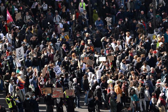 Protesters gather ahead of a demonstration to protest against the "high cost of living", at Place de la Republique in Paris on October 17, 2026 as part of a nationwide call for mobilisation bringing together various groups expressing their anger: former "Yellow Vests", secondary school and university students, climate activists and even farmers. After weeks of student protests, France faces broader, nationwide demonstrations on October 17, 2026 over the cost of living, setting up a potentially fraught six months heading into a presidential election. A police source told AFP that authorities estimated nearly 200,000 people could take part, with 40,000 in Paris. (Photo by Guillaume Saligot / AFP)