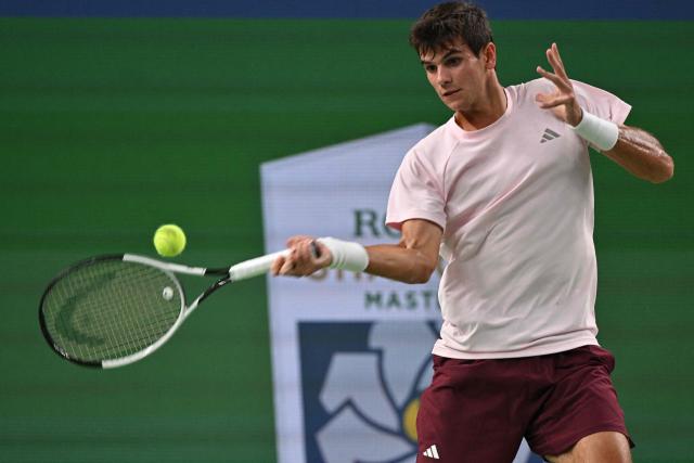 Spain's Rafael Jodar hits a return to Russia's Daniil Medvedev during their men's singles semi-final match at the Shanghai Masters tennis tournament in Shanghai on October 17, 2026. (Photo by Hector RETAMAL / AFP)