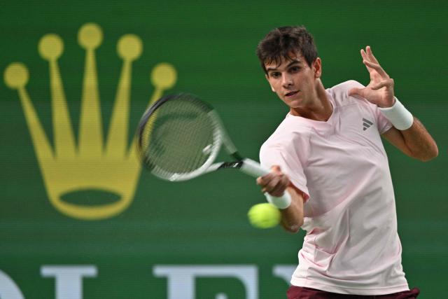 Spain's Rafael Jodar hits a return to Russia's Daniil Medvedev during their men's singles semi-final match at the Shanghai Masters tennis tournament in Shanghai on October 17, 2026. (Photo by Hector RETAMAL / AFP)