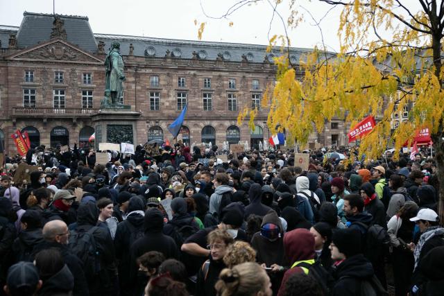 Protesters take part in a demonstration against the "high cost of living", in Strasbourg, northeastern France, on October 17, 2026 as part of a nationwide call for mobilisation bringing together various groups expressing their anger: former "Yellow Vests", secondary school and university students, climate activists and even farmers. After weeks of student protests, France faces broader, nationwide demonstrations on October 17, 2026 over the cost of living, setting up a potentially fraught six months heading into a presidential election. A police source told AFP that authorities estimated nearly 200,000 people could take part, with 40,000 in Paris. (Photo by ROMEO BOETZLE / AFP)