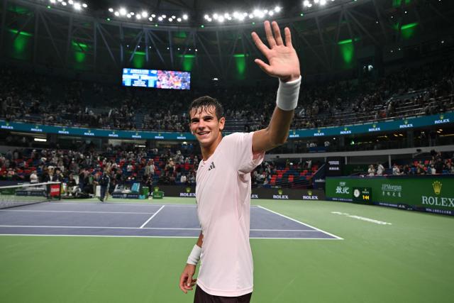 Spain's Rafael Jodar waves to fans after his victory against Russia's Daniil Medvedev during their men's singles semi-final match at the Shanghai Masters tennis tournament in Shanghai on October 17, 2026. (Photo by Hector RETAMAL / AFP)