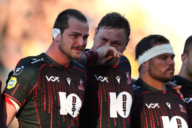 Lions players observe a moment of silence in honour of their teammate Hyron Andrews, ahead of the European Rugby Champions Cup rugby union match between Stade Rochelais (La Rochelle) and Lions at at the Marcel-Deflandre Stadium in La Rochelle, western France, on October 17, 2026. South African second row Hyron Andrews of Johannesburg-based side the Lions was found dead at a hotel in France on October 16, on the eve of his team's Champions Cup match against La Rochelle, local authorities told AFP. (Photo by ROMAIN PERROCHEAU / AFP)