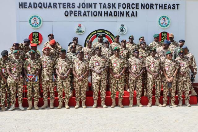 Nigeria's Chief of Army Staff (COAS) Lieutenant General Waidi Shaibu (front C) poses for a photograph with military personnel during his visit to the Headquarters Theatre Command Joint Task Force in Maiduguri, on October 17, 2026. Suspected jihadists believed to be linked to the Islamic State (IS) group killed 15 soldiers and five members of anti-jihadist militias in an attack on a base in Borno State, in northeastern Nigeria, military and local sources said on October 14. "The terrorists killed 15 soldiers and five members of the CJTF militia who were assisting the soldiers in the attack," a Nigerian army officer told AFP. (Photo by Audu MARTE / AFP)