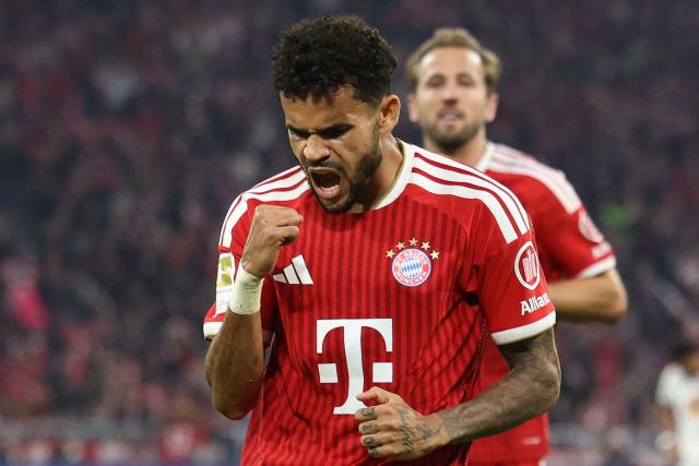 Bayern Munich's Colombian forward #14 Luis Diaz celebrates scoring the opening goal with his teammates during the German first division Bundesliga football match between FC Bayern Munich and RB Leipzig in Munich, southern Germany, on October 17, 2026. (Photo by Alexandra BEIER / AFP) / DFL REGULATIONS PROHIBIT ANY USE OF PHOTOGRAPHS AS IMAGE SEQUENCES AND/OR QUASI-VIDEO   ALTERNATIVE CROP
