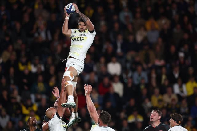 La Rochelle' Samoan flanker Theo McFarland catches the ball in a lineout during the European Rugby Champions Cup rugby union match between Stade Rochelais (La Rochelle) and Lions at at the Marcel-Deflandre Stadium in La Rochelle, western France, on October 17, 2026. (Photo by ROMAIN PERROCHEAU / AFP)
