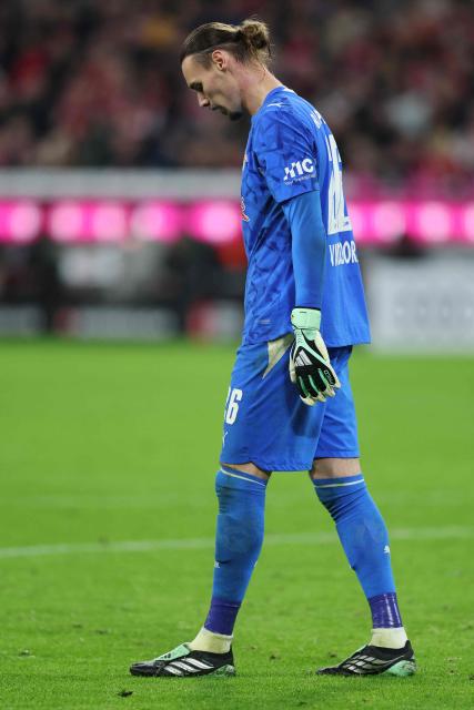Leipzig's Belgian goalkeeper #26 Maarten Vandevoordt reacts after coinciding 6 goals during the German first division Bundesliga football match between FC Bayern Munich and RB Leipzig in Munich, southern Germany, on October 17, 2026. (Photo by Alexandra BEIER / AFP) / DFL REGULATIONS PROHIBIT ANY USE OF PHOTOGRAPHS AS IMAGE SEQUENCES AND/OR QUASI-VIDEO