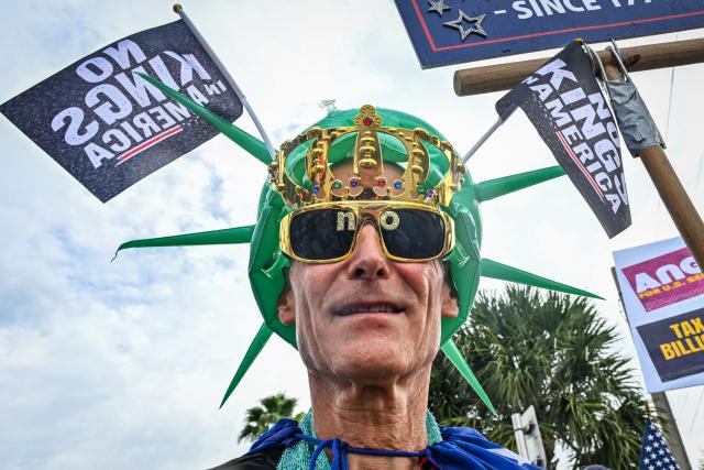People take part in a "No Kings: Vote Early" demonstration in Wilton Manors, Florida, on October 17, 2026. The national day of action is taking place in cities across the country focusing on voter turnout, early voting and election protection, ahead of the midterm elections. (Photo by Giorgio VIERA / AFP)