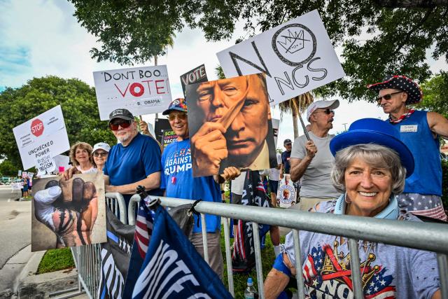 People take part in a "No Kings: Vote Early" demonstration in Wilton Manors, Florida, on October 17, 2026. The national day of action is taking place in cities across the country focusing on voter turnout, early voting and election protection, ahead of the midterm elections. (Photo by Giorgio VIERA / AFP)