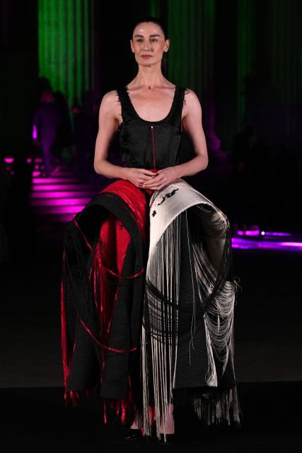 British model Erin O'Connor poses upon arrival to attend The British Museum Ball 2026 in London on October 17, 2026. (Photo by CARLOS JASSO / AFP)