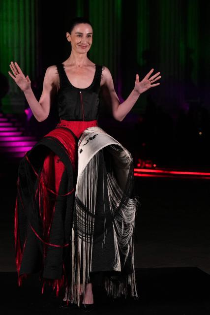 British model Erin O'Connor poses upon arrival to attend The British Museum Ball 2026 in London on October 17, 2026. (Photo by CARLOS JASSO / AFP)
