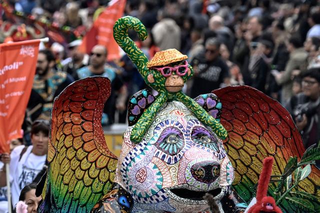 An alebrije sculpture is displayed during the Alebrijes Parade ahead of Day of the Dead celebrations in Mexico City on October 17, 2026. The Alebrijes Parade is an annual event celebrating Mexican folk art and handicrafts, during which giant mythical creatures made of "cartoneria" (a form of papier-mache) are paraded from Mexico City's Zocalo through the capital's main avenues to the Angel of Independence, where they remain on display. (Photo by Alfredo ESTRELLA / AFP)