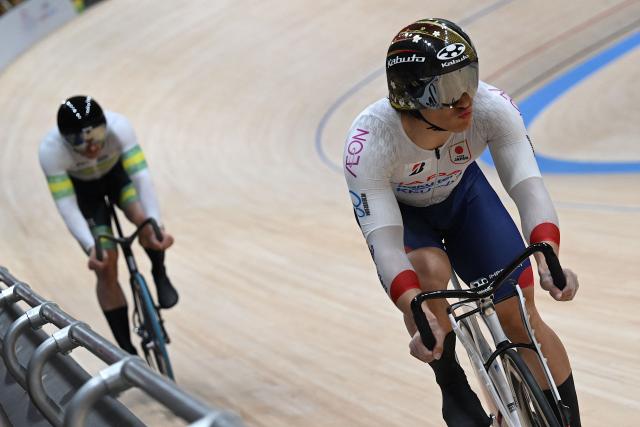 Japan’s Kaiya Ota (R) and Australia’s Leigh Hoffman compete in the men’s sprint semifinal at the 2026 UCI Track World Championships at the Shanghai Velodrome in Shanghai on October 18, 2026. (Photo by JADE GAO / AFP)