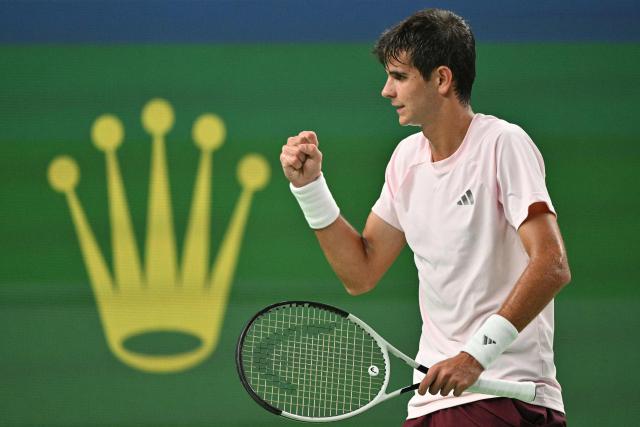 Spain's Rafael Jodar celebrates a point against Spain's Alejandro Davidovich Fokina during their men's singles final match at the Shanghai Masters tennis tournament in Shanghai on October 18, 2026. (Photo by HECTOR RETAMAL / AFP)