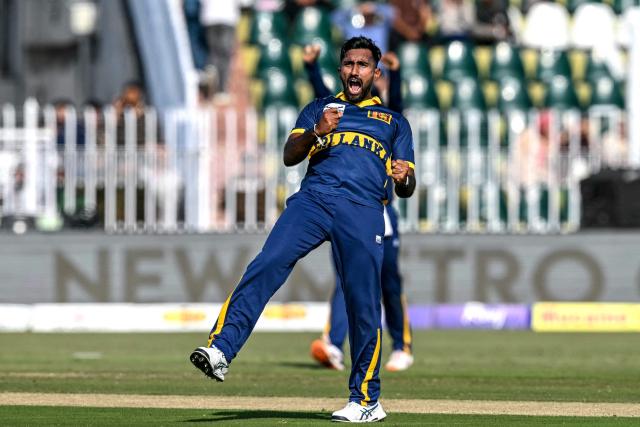 Sri Lanka's Eshan Malinga celebrates after taking the wicket of Pakistan's Saad Baig during the tri-series one-day international (ODI) cricket match between Pakistan and Sri Lanka at the Rawalpindi Cricket Stadium in Rawalpindi on October 18, 2026. (Photo by Aamir QURESHI / AFP)