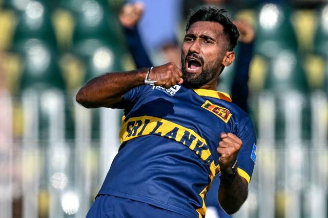 Sri Lanka's Eshan Malinga celebrates after taking the wicket of Pakistan's Saad Baig during the tri-series one-day international (ODI) cricket match between Pakistan and Sri Lanka at the Rawalpindi Cricket Stadium in Rawalpindi on October 18, 2026. (Photo by Aamir QURESHI / AFP)