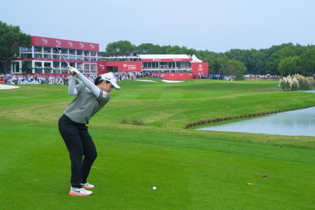 South Korea's Choi Hye-jin plays a shot during the final round of the Buick LPGA Shanghai golf tournament in Shanghai on October 18, 2026. (Photo by CN-STR / AFP) / China OUT