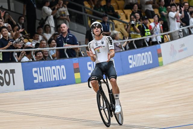 Germany’s Tim Torn Teutenberg celebrates after winning in the men’s elimination race at the 2026 UCI Track World Championships at the Shanghai Velodrome in Shanghai on October 18, 2026. (Photo by JADE GAO / AFP)