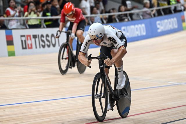 Germany’s Tim Torn Teutenberg (R) competes in the men’s elimination race at the 2026 UCI Track World Championships at the Shanghai Velodrome in Shanghai on October 18, 2026. (Photo by JADE GAO / AFP)