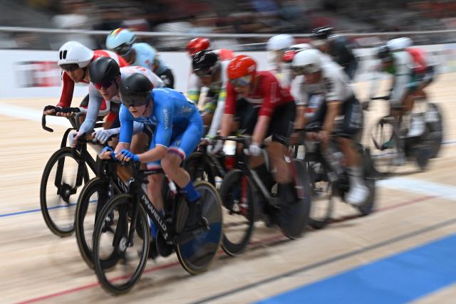 Czechia’s Adam Krenek (front) competes in the men’s elimination race at the 2026 UCI Track World Championships at the Shanghai Velodrome in Shanghai on October 18, 2026. (Photo by JADE GAO / AFP)