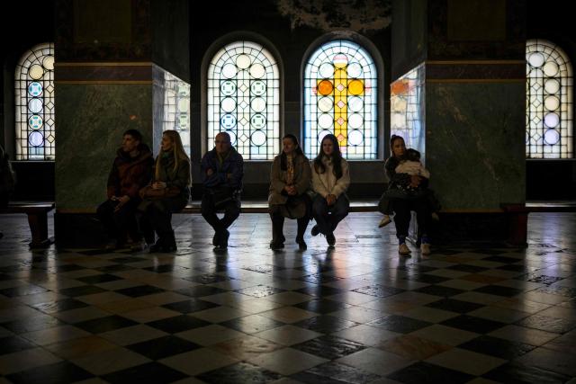 People attend a service led by the Ecumenical Patriarch Bartholomew I in Alexander Nevsky Cathedral in Sofia on October 18, 2026. (Photo by Nikolay DOYCHINOV / AFP)