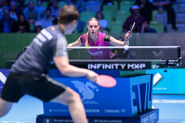 Germany’s Annett Kaufmann (R) competes against Germany’s Nina Mittelham during the women’s singles semi-final match of the 2026 ETTU European Individual Table Tennis Championships at the Arena Stozice in Ljubljana, Slovenia on October 18, 2026. (Photo by Jure Makovec / AFP)