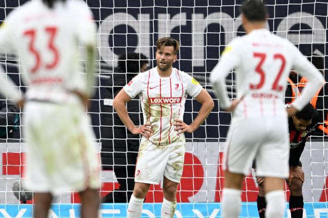 Freiburg's German forward #09 Lucas Hoeler reacts after the German first division Bundesliga football match between Bayer Leverkusen and SC Freiburg in Leverkusen, western Germany, on October 18, 2026. (Photo by INA FASSBENDER / AFP) / DFL REGULATIONS PROHIBIT ANY USE OF PHOTOGRAPHS AS IMAGE SEQUENCES AND/OR QUASI-VIDEO