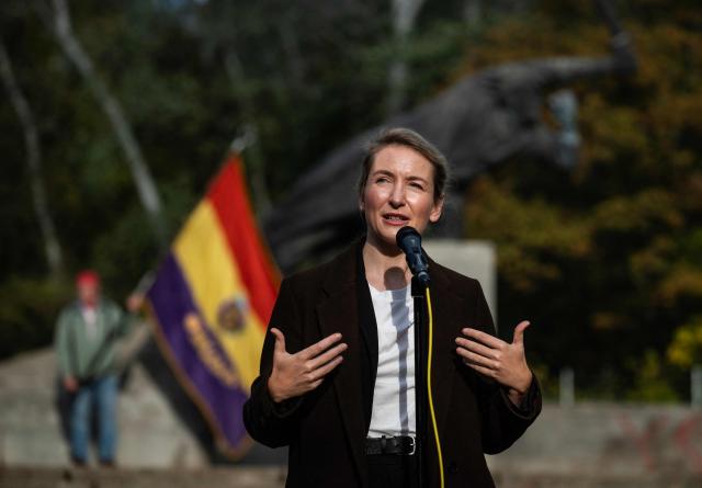 Co-leader of the Left party (Die Linke) Ines Schwerdtner addresses demonstrators at a Berlin memorial for German members of the International Brigades who fought for Republican Spain during the Spanish Civil War (1936-39), during a commemoration by various leftist organisations on the 90th anniversary of the start of the war, and the formation of the International Brigades, on October 18, 2026. Some 4,000 to 5,000 German volunteers, many of them anti-fascist exiles, communists, and working-class veterans of the Weimar Republic, fought in Spain. (Photo by John MACDOUGALL / AFP)