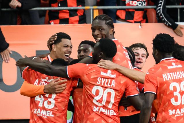 Lorient's French midfielder #08 Noah Cadiou (L) celebrates scoring his team's first goal during the French L1 football match between FC Lorient and AS Monaco at the Stade du Moustoir in Lorient, western France, on October 18, 2026. (Photo by Loic VENANCE / AFP)