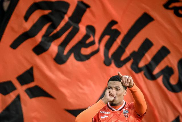 Lorient's French midfielder #08 Noah Cadiou celebrates scoring his team's first goal during the French L1 football match between FC Lorient and AS Monaco at the Stade du Moustoir in Lorient, western France, on October 18, 2026. (Photo by Loic VENANCE / AFP)