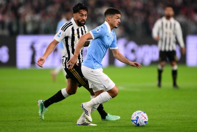 Lazio’s Moroccan midfielder #21 Reda Belahyane fights for the ball with Juventus’ Argentine forward #31 Nico Gonzalez during the Italian Serie A football match between Juventus and Lazio at the Allianz Stadium, in Turin on October 18, 2026. (Photo by Marco Bertorello / AFP)