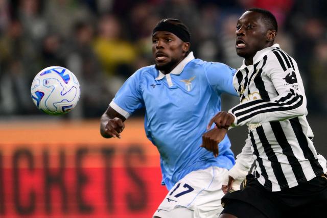Juventus’ French forward #09 Randal Kolo Muani (R) fights for the ball with Lazio’s Portuguese defender #17 Nuno Tavares (L) during the Italian Serie A football match between Juventus and Lazio at the Allianz Stadium, in Turin on October 18, 2026. (Photo by Marco Bertorello / AFP)