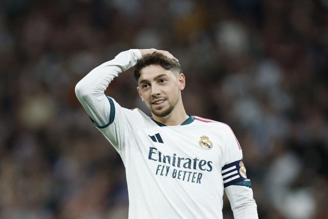 Real Madrid's Uruguayan midfielder #08 Federico Valverde reacts during the Spanish league football match between Real Madrid CF and Sevilla FC at the Santiago Bernabeu stadium in Madrid on October 18, 2026. (Photo by Oscar DEL POZO / AFP)