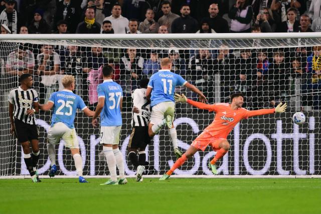 Lazio’s Danish defender #25 Oliver Provstgaard (2nd L) scores his team's first goal during the Italian Serie A football match between Juventus and Lazio at the Allianz Stadium, in Turin on October 18, 2026. (Photo by Marco Bertorello / AFP)