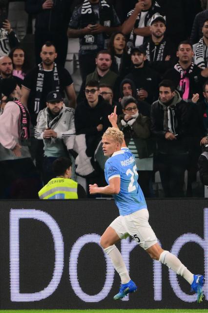 Lazio’s Danish defender #25 Oliver Provstgaard celebrates scoring his team's first goal during the Italian Serie A football match between Juventus and Lazio at the Allianz Stadium, in Turin on October 18, 2026. (Photo by Marco Bertorello / AFP)