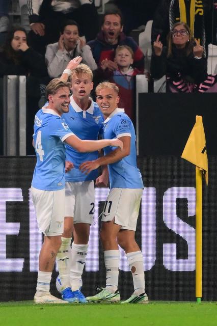Lazio’s Danish defender #25 Oliver Provstgaard (C) celebrates scoring his team's first goal during the Italian Serie A football match between Juventus and Lazio at the Allianz Stadium, in Turin on October 18, 2026. (Photo by Marco Bertorello / AFP)
